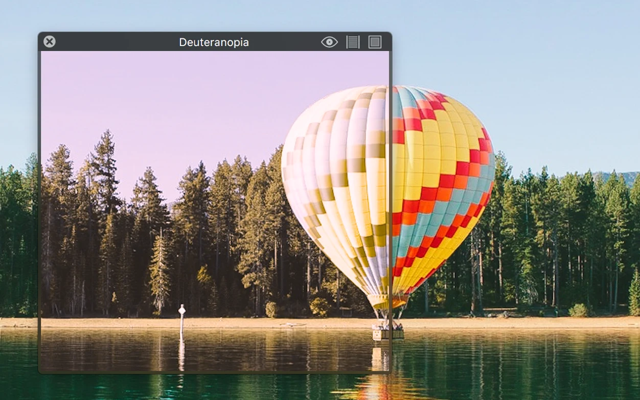 A picture of an air balloon with yellow, red and blue colours. Viewed through the Sim Daltonism window with its filter set to Deuteranopia, the reds have changed to greens